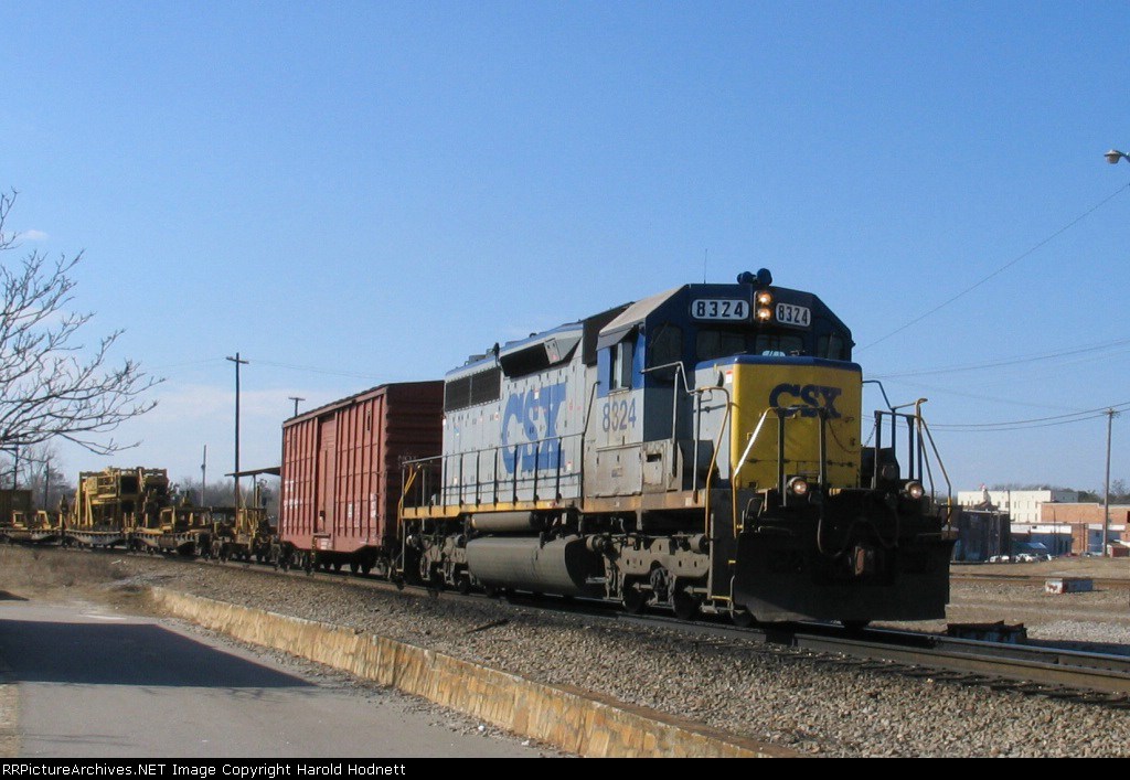 CSX 8324 leads a work train into Hamlet Yard